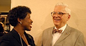 Gwen Ifill laughing with mentor and professor Alden Poole