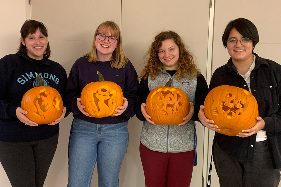 Sara with her friends (fellow honors students) during the pumpkin carving event