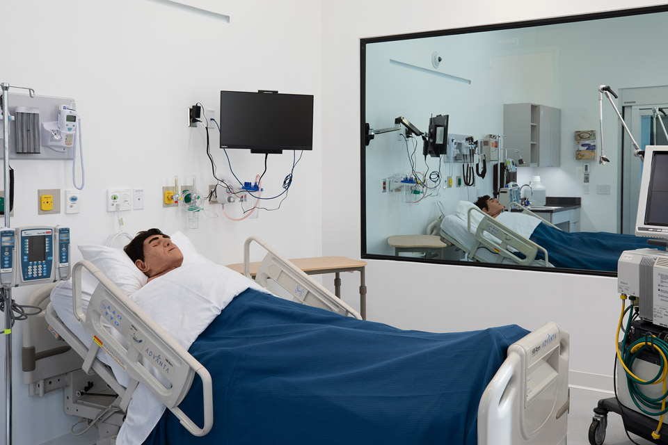 Mannequin in bed in simulation lab
