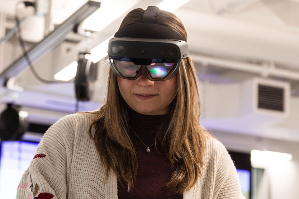 Woman wearing Hololens goggles