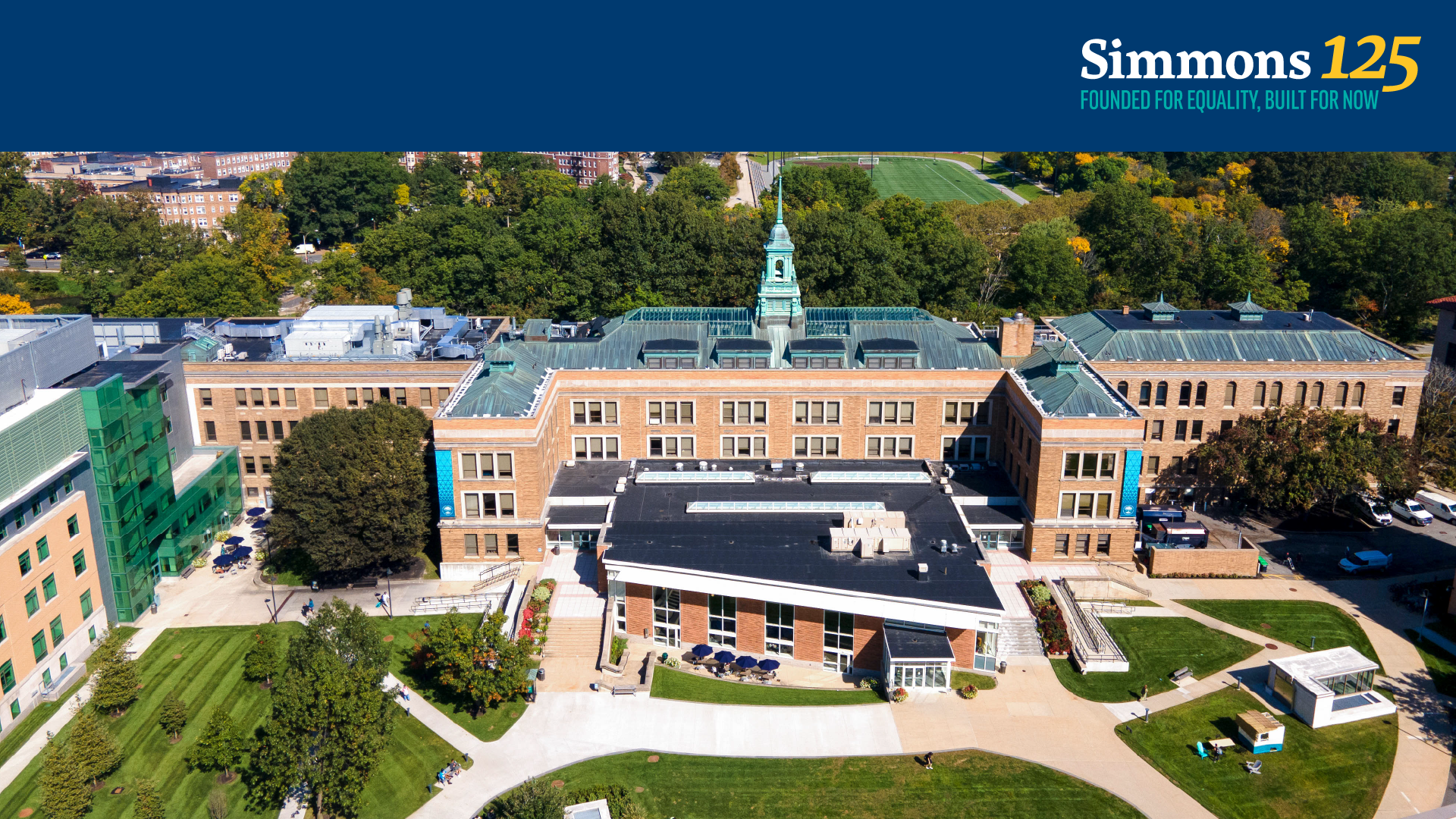 A Zoom background for the Simmons 125th Anniversary featuring an aerial photo of the Simmons University campus
