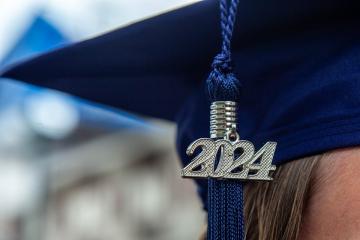 A close-up image of a 2024 tassle hanging from a graduation cap