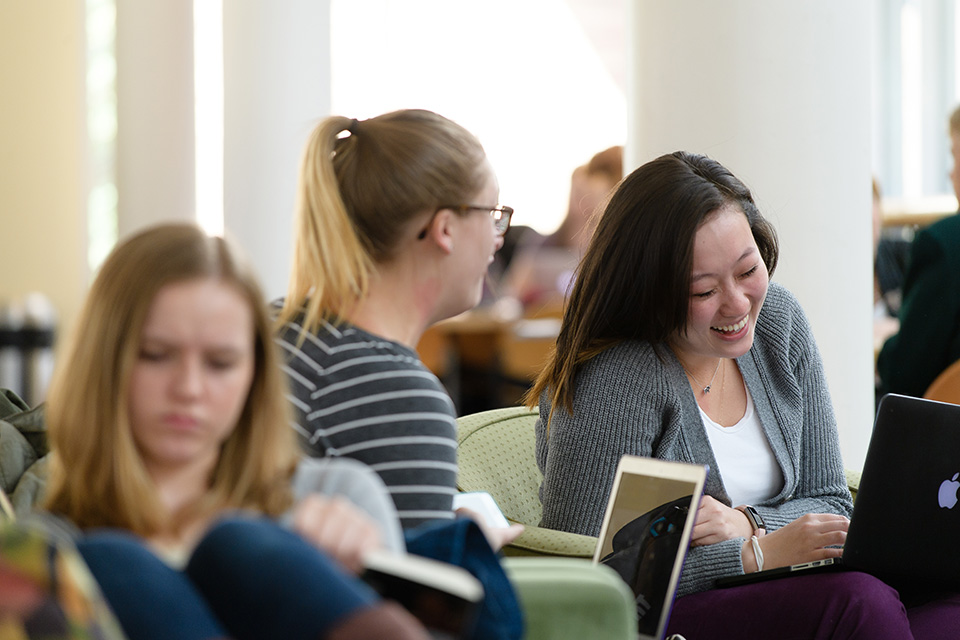 Students sitting together and laughing