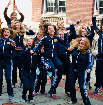 Swim team members celebrating.