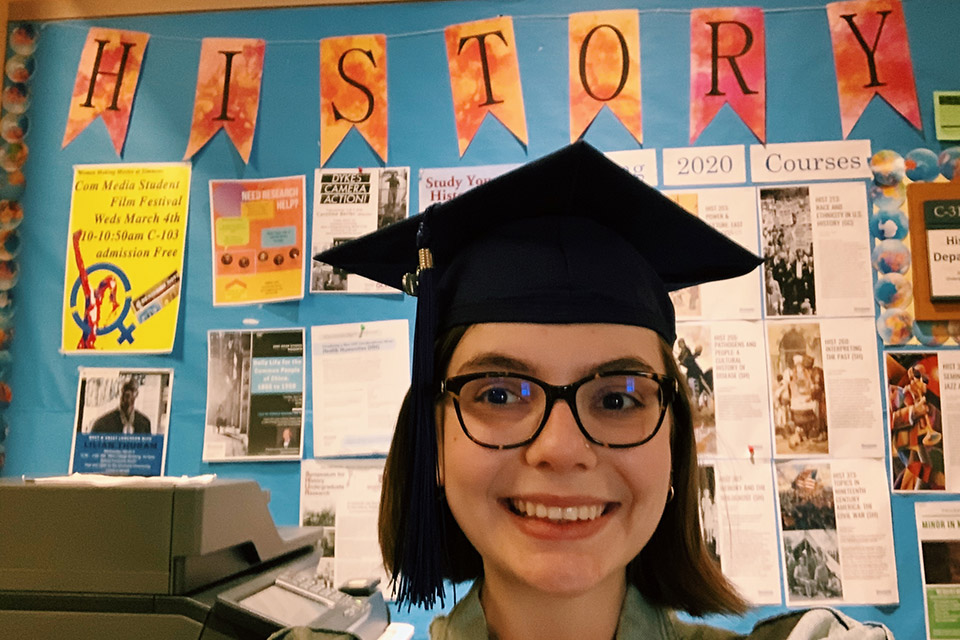 Lilli Thorne in front of the History Department