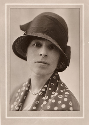 Headshot of Eva Whiting White