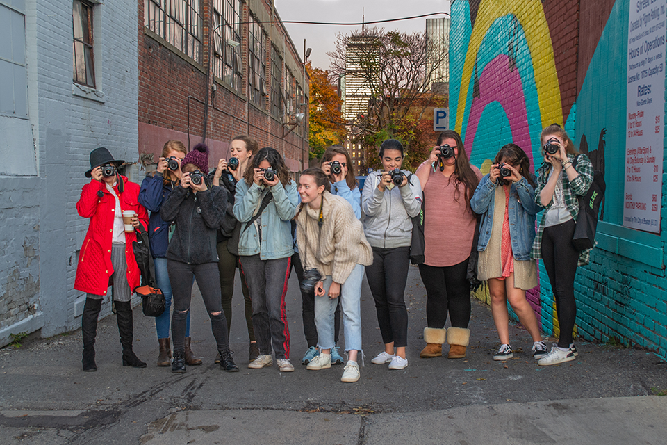 Photography students with cameras