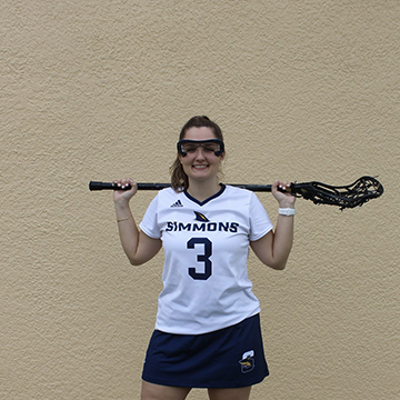 Vini Delgadillo in her lacrosse uniform