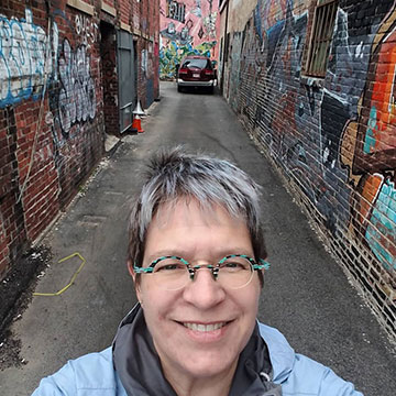 Selfie of Ann Graff on the Panopticon graffiti art walk in the spring of 2019.