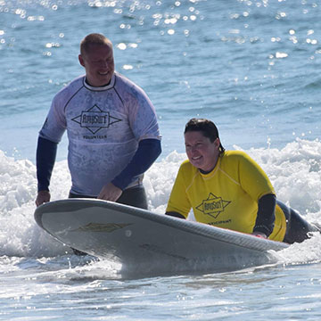 Daniel Leary, MSW program student, working with AmpSurf