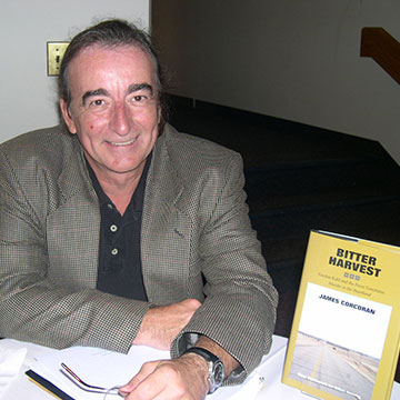 Jim Corcoran with his book, Bitter Harvest