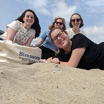 Sara Mitchell on beach with friends