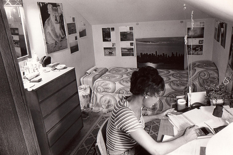 Student studying in her dorm room in the 1970s