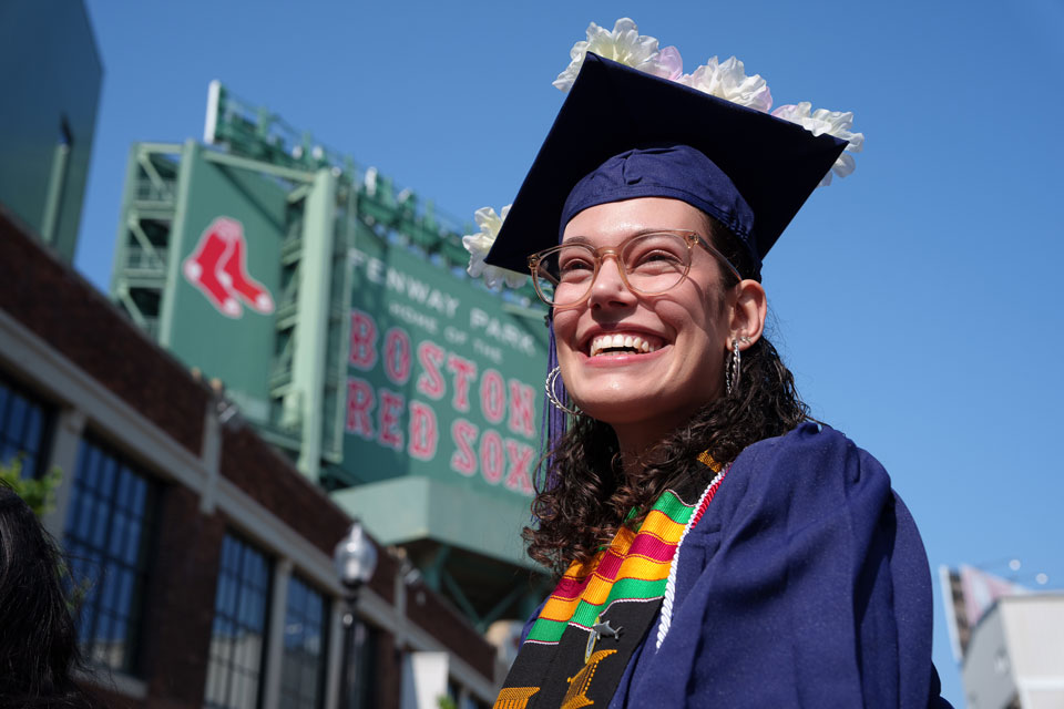 News | Commencement 2023 Student outside Fenway