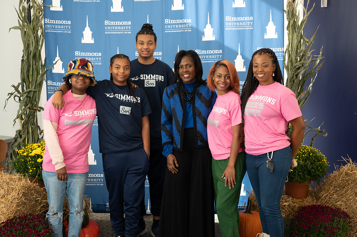 President Lynn Perry Wooten greets alumnae/i and their families, photograph by Kristie Dean