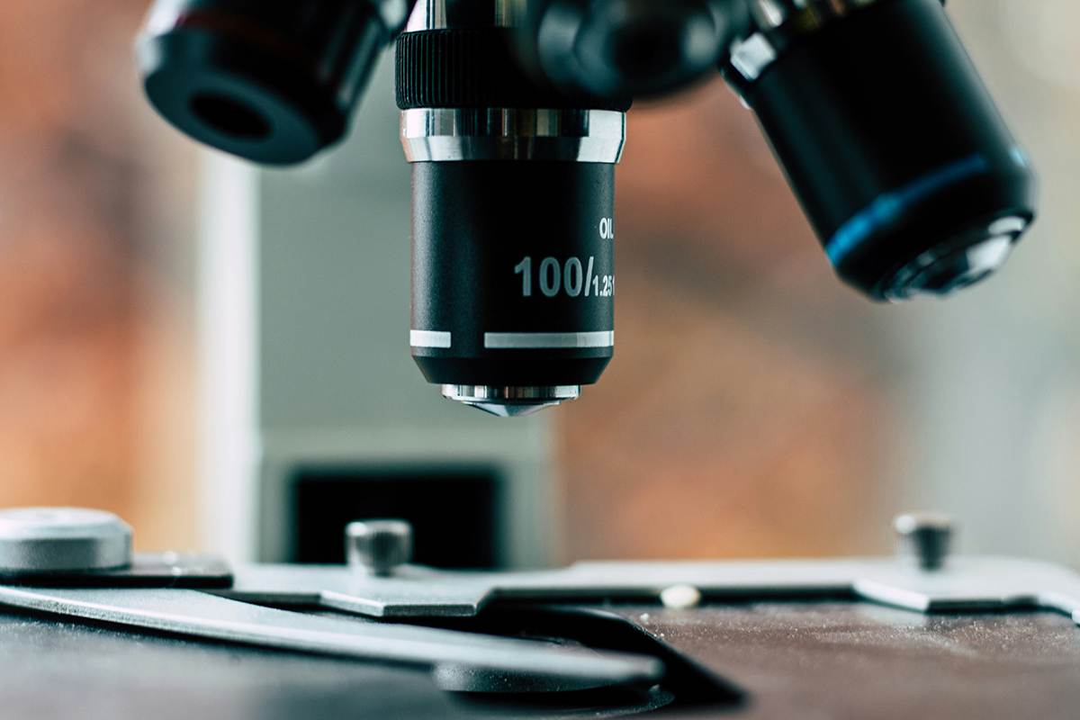 A close-up image of a high powered microscope