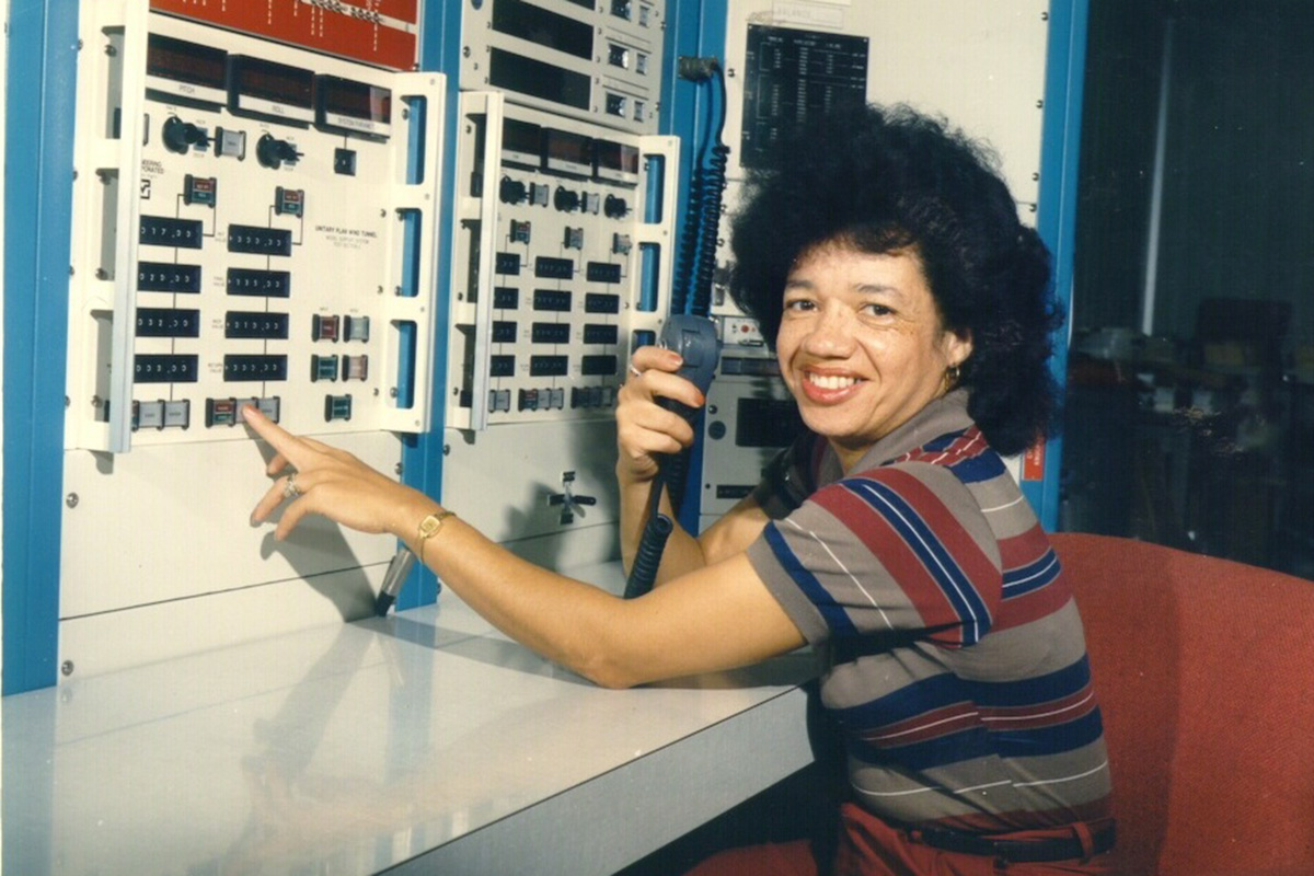 Christine Darden sitting at a control panel