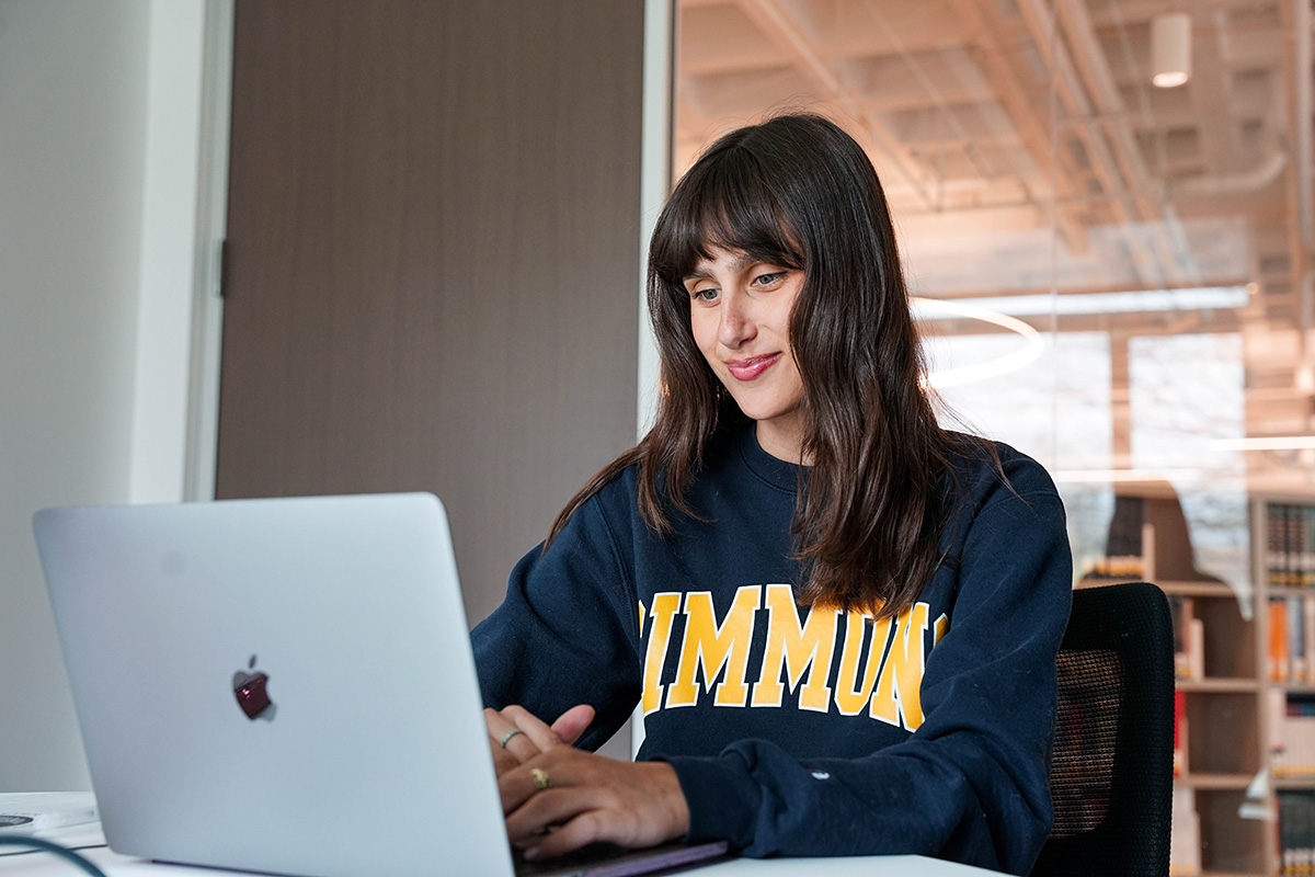 Student at laptop in study area