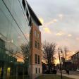 The outside of the Simmons Library at sunset