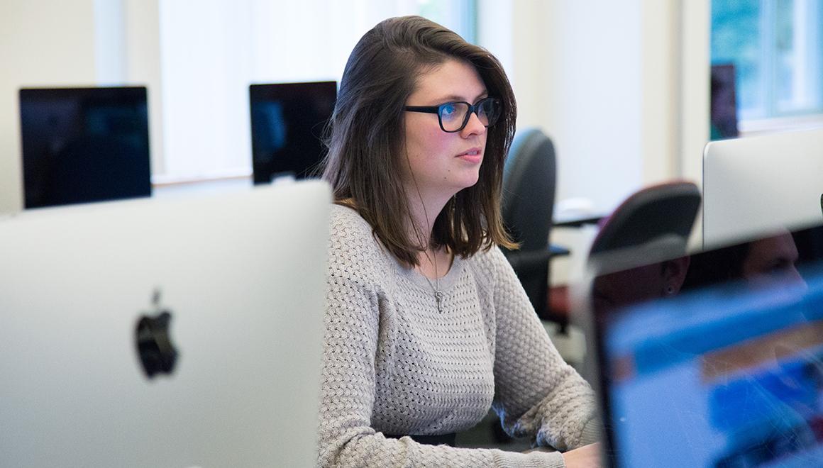 Student sitting at a computer