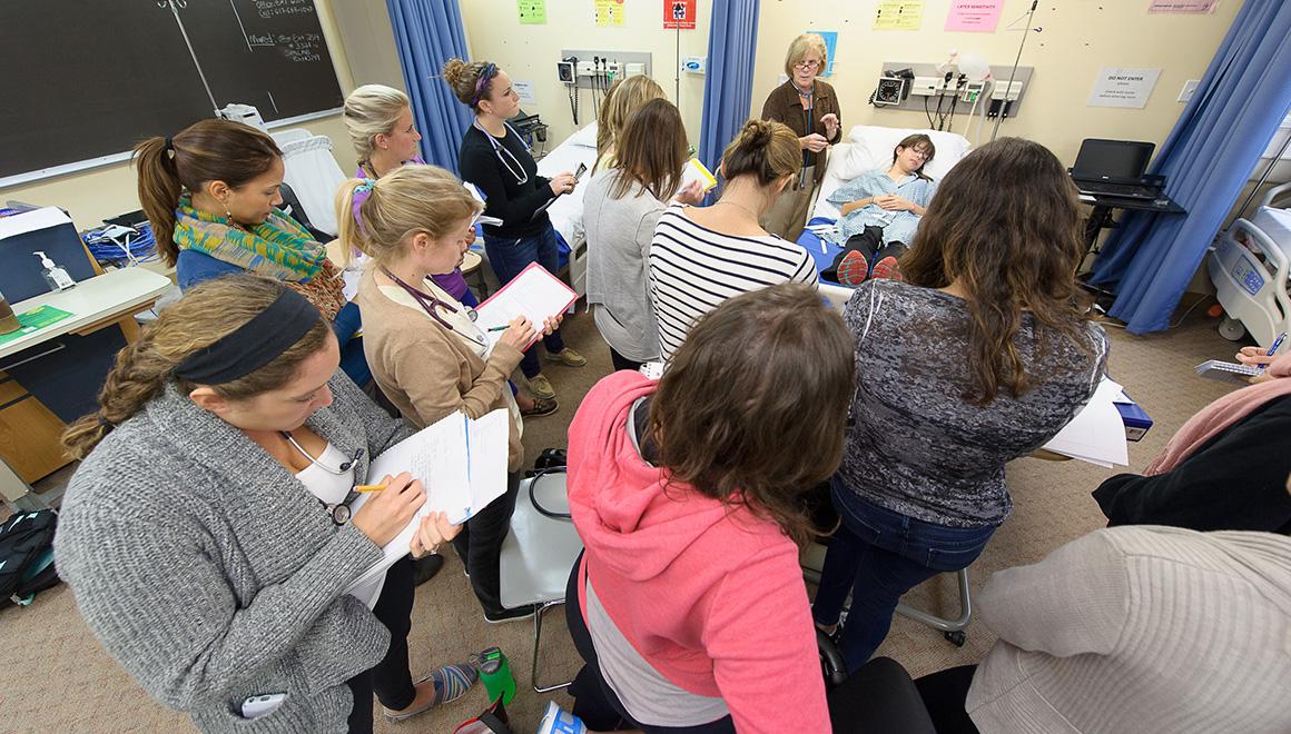 Students in a nursing simulation lab