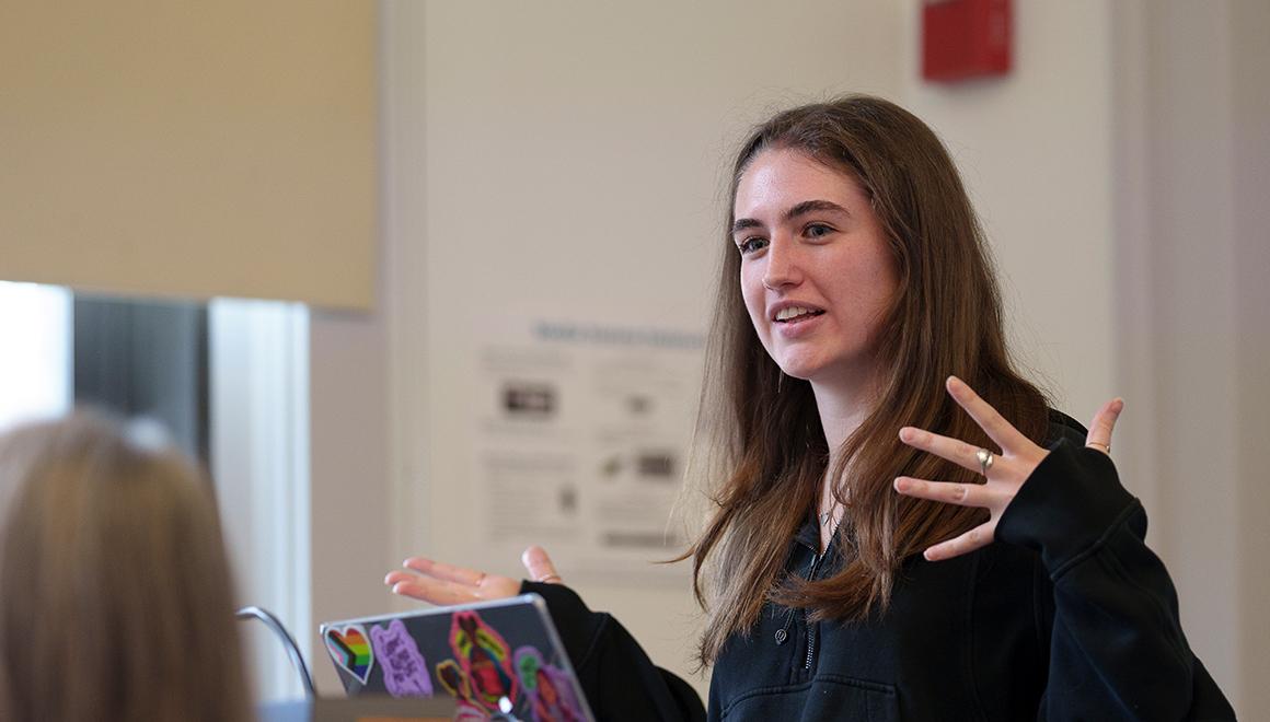 Public Health student engages in class.