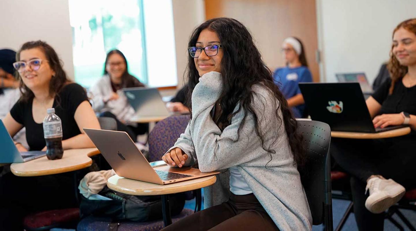 A group of Simmons behavior analysis students in a classroom