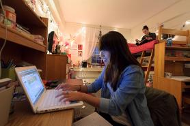 Students sitting in their dorm room