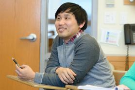 Graduate student sitting in class