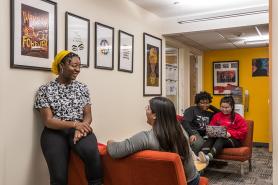 Students sitting together in the Multicultural Center