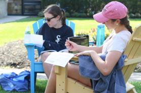 Students sitting on the quad