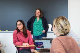 Students in a Simmons School of Social Work class with faculty member Noelle Dimitri