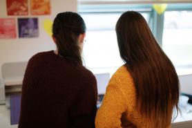 A back shot photo of Simmons Students working in the Makerspace