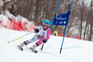 Lindsey Sumpman in downhill skiing competition.