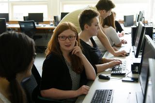 Students studying in a computer lab.