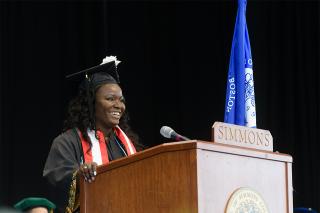 Tozoe Marton speaking at commencement.