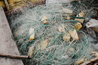 Tangle of fishing nets in a boat.