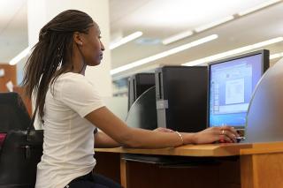 Student sitting at a computer