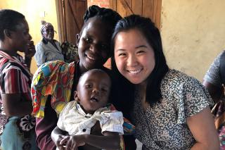Donata Liu with a Malawian woman and her child.