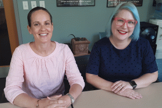 Lydia Ogden and Rachel Williams sitting next to each other.