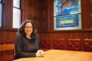 Eileen Fontenot '14MS in the Thomas Crane Library