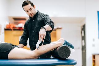 Mike Welch working in the athletic training office