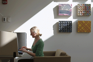 Student working at a computer.