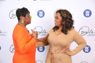 Leslie Morris speaking with Oprah Winfrey during the Oprah Winfrey National Tour.