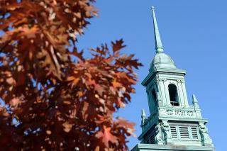 Main College Building cupola with fall leaves