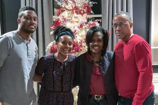 Lynn Perry Wooten with her husband, son and daughter.
