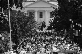 On the afternoon of June 7th, there are still masses of protestors in D.C. These photos were taken from six blocks north of Lafayette Square, looking down toward the White House. A Black Lives Matter banner has been added to the new fence blocking off Lafayette Square, and part of it is visible in this photo.