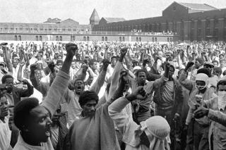 African American men during a prison rebellion