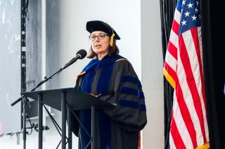 Interim Dean of COCIS Sanda Erdelez at Commencement 2022