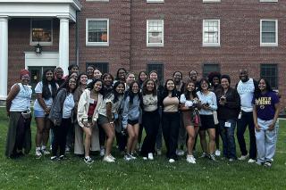 Bridge Program Students and Staff posing in front of building